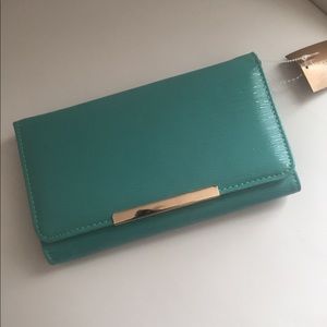 Adorable spring/summer purse in turquoise.  NWT